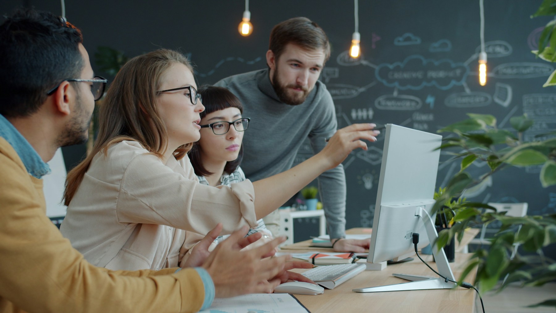 Collaborative team discussing a digital product